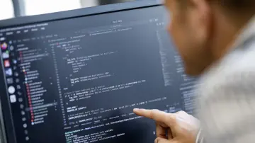 merkur-group-careers-it-gallery-programming-code-screen