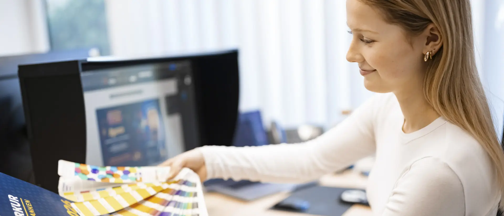merkur-group-careers-corporate-functions-media-graphics-design