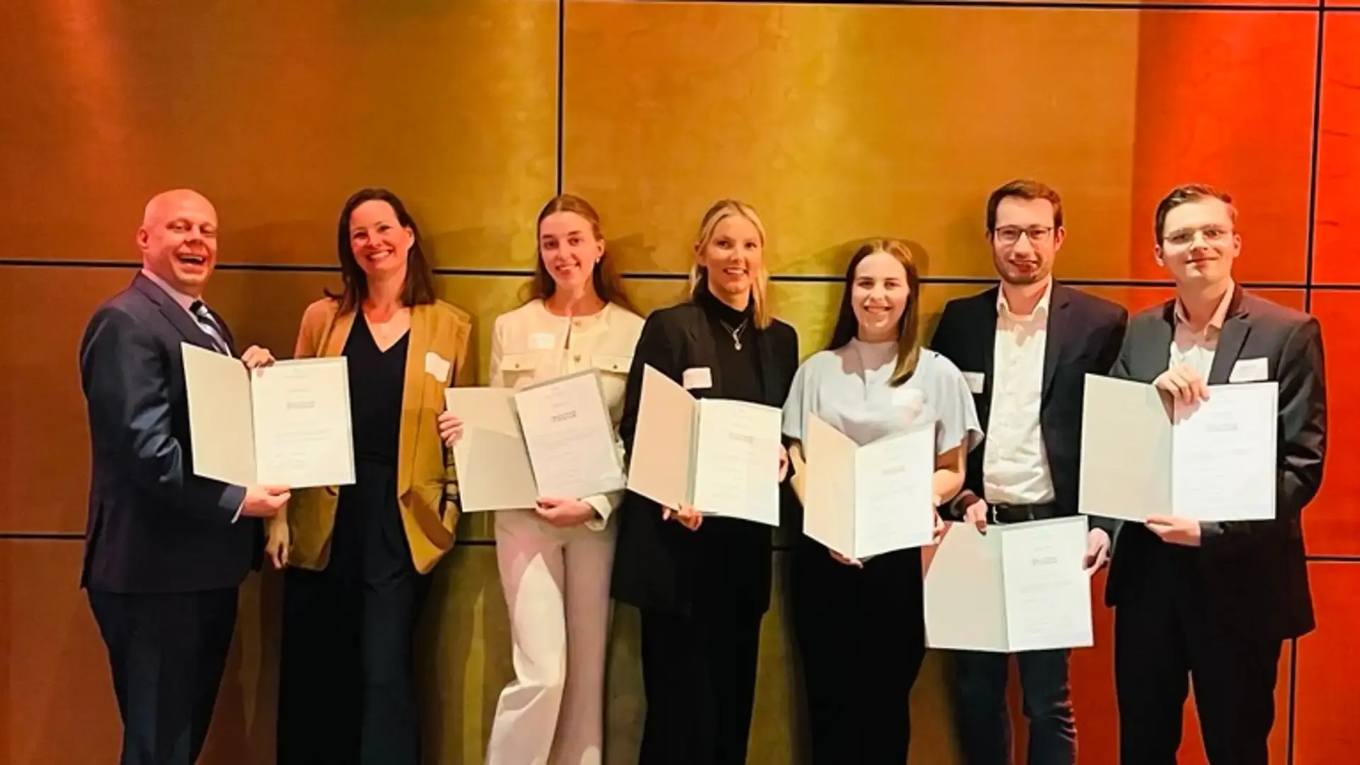 merkur-group-careers-students-scholarship-recipients-certificate-award.jpg