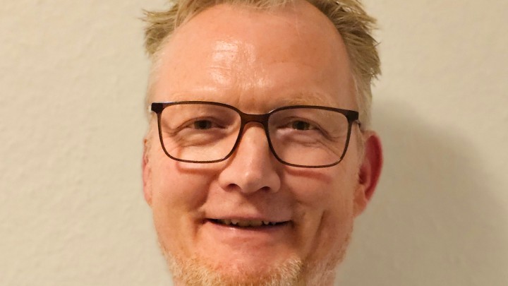 Stefan Helmich seit 25 Jahren Softwareentwickler bei der Merkur Group